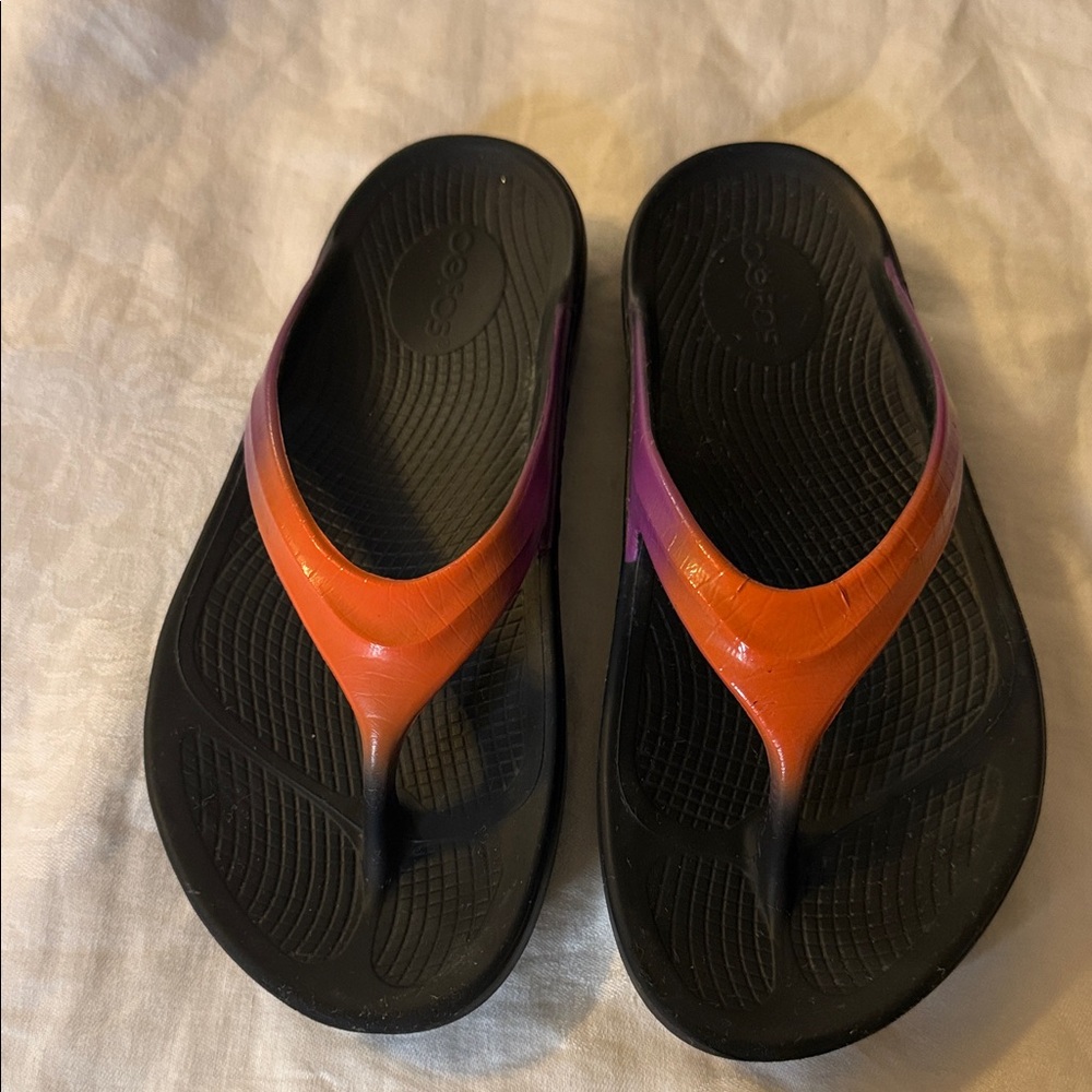 OOFOS Black Flip Flops with Orange to Purple Straps